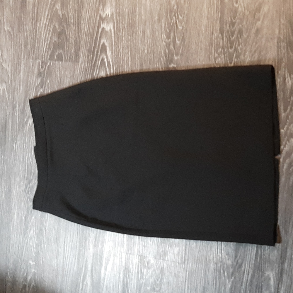 Black knee-length pencil skirt